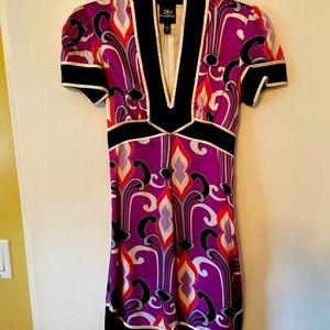 Beautiful satin Bebe short length dress